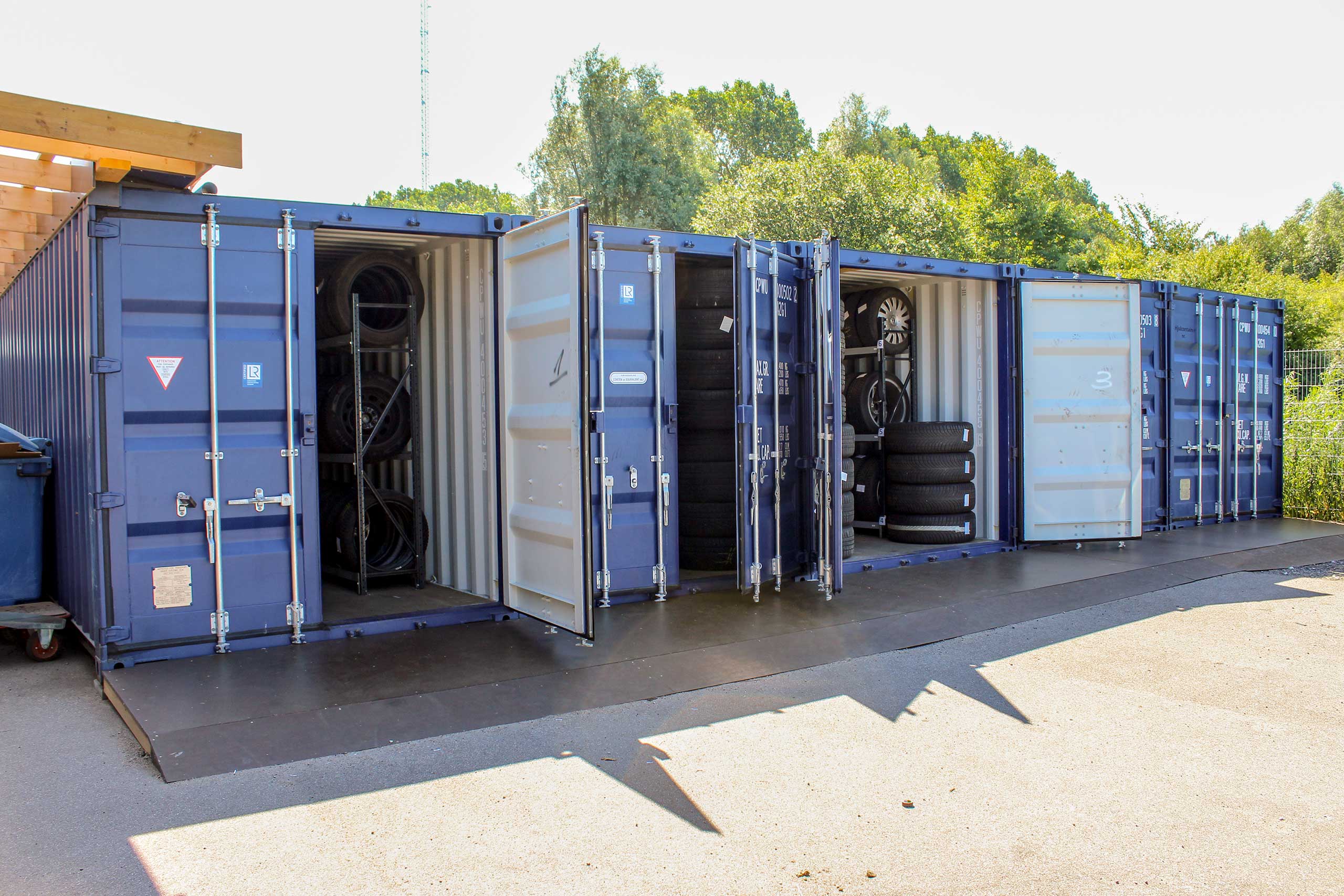 Dækreoler i container